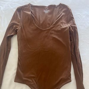 Nuuds long sleeve body suit. Size XS Never worn